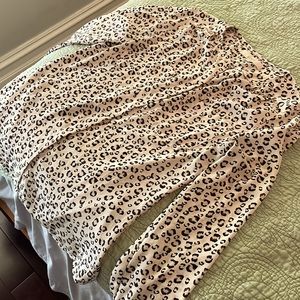 Size M, Loft animal print blouse.  Slight pink/off white hue.